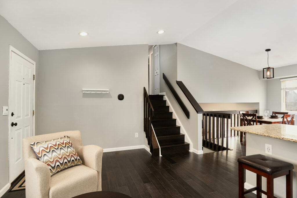 From the main level, you can go up to the bedrooms or down to the family room and TV room.